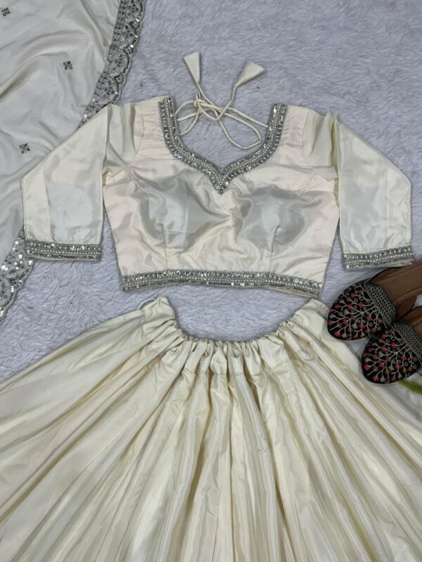 White Elegant soft look lehenga gold sequence