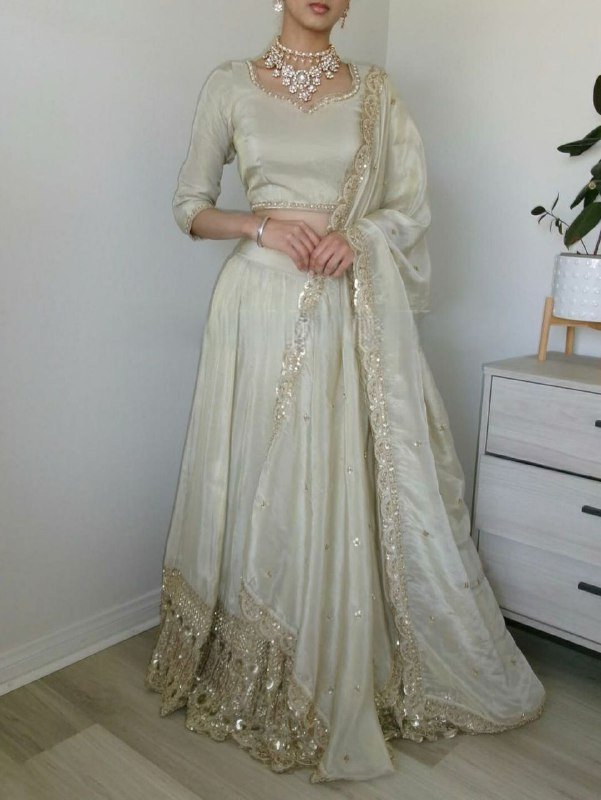 White Elegant soft look lehenga gold sequence