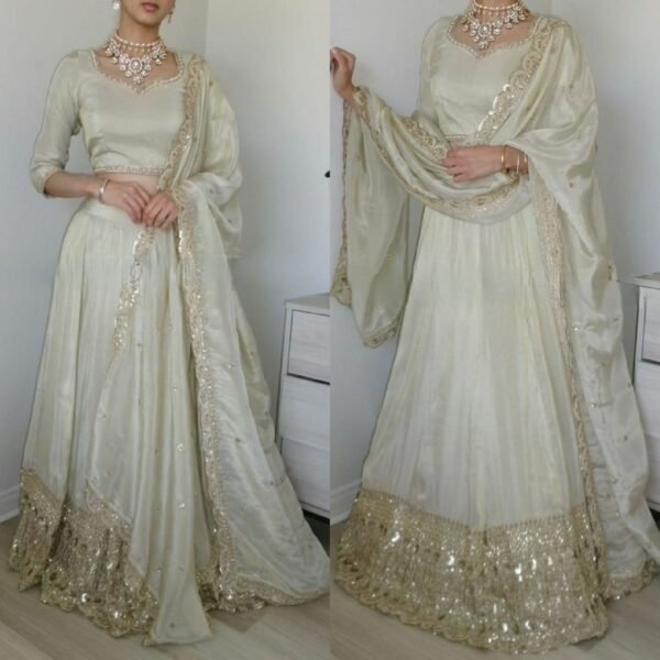 White Elegant soft look lehenga gold sequence