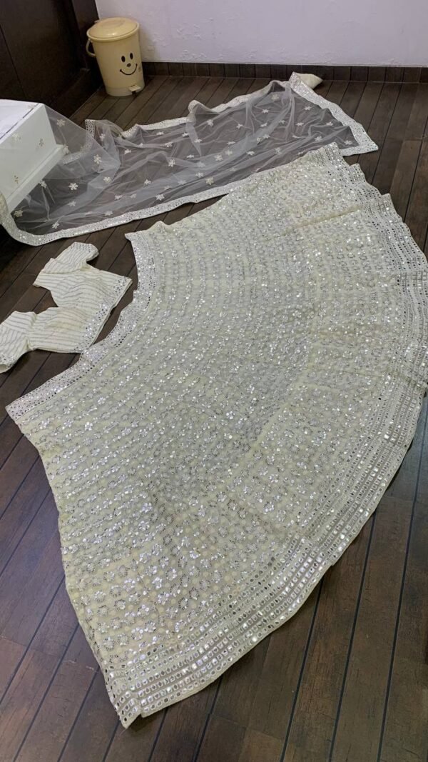 White mirror like foil work design dinner lehenga