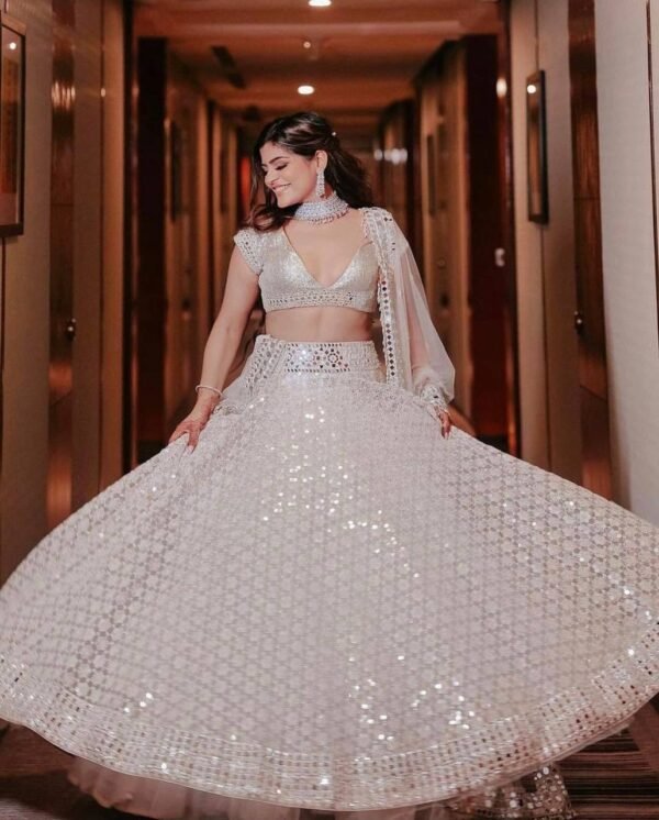 White mirror like foil work design dinner lehenga