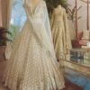 White mirror like foil work design dinner lehenga