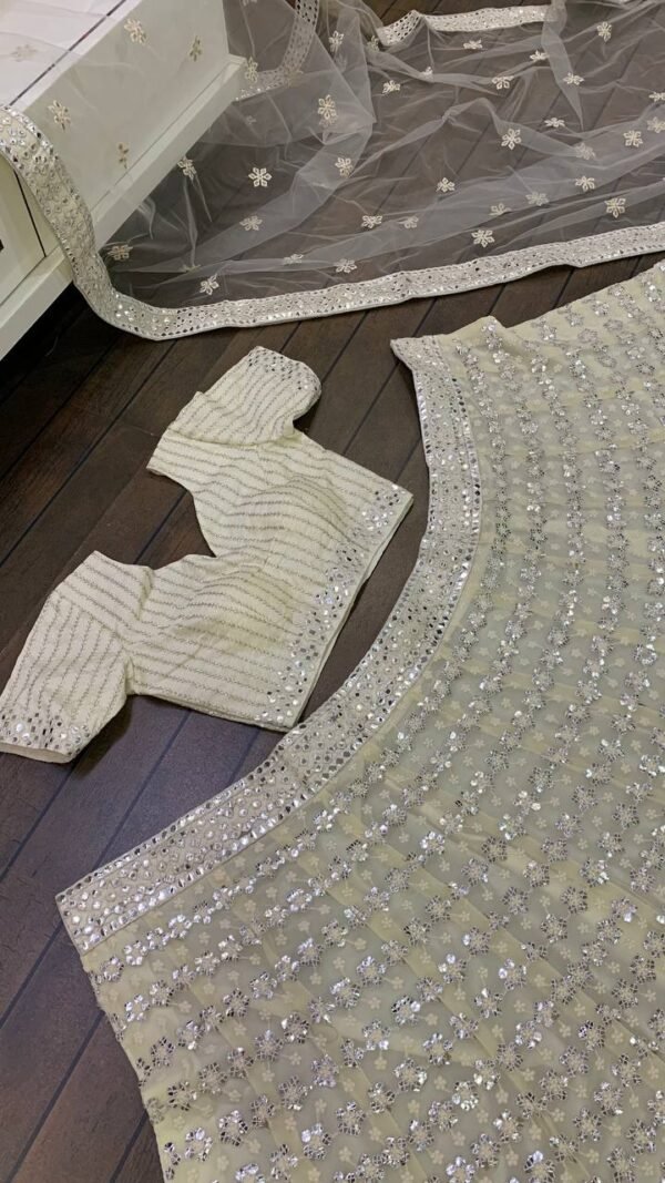 White mirror like foil work design dinner lehenga