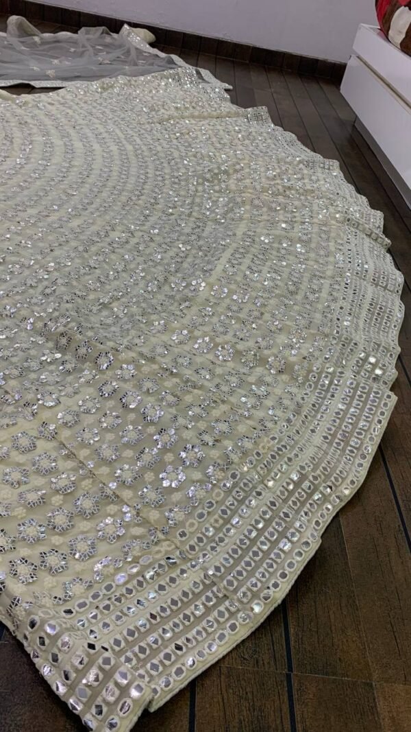 White mirror like foil work design dinner lehenga