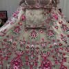White lehenga with pink floral elegant dinner lehenga