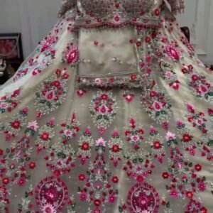 White lehenga with pink floral elegant dinner lehenga