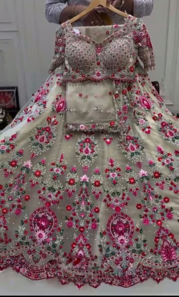 White lehenga with pink floral elegant dinner lehenga