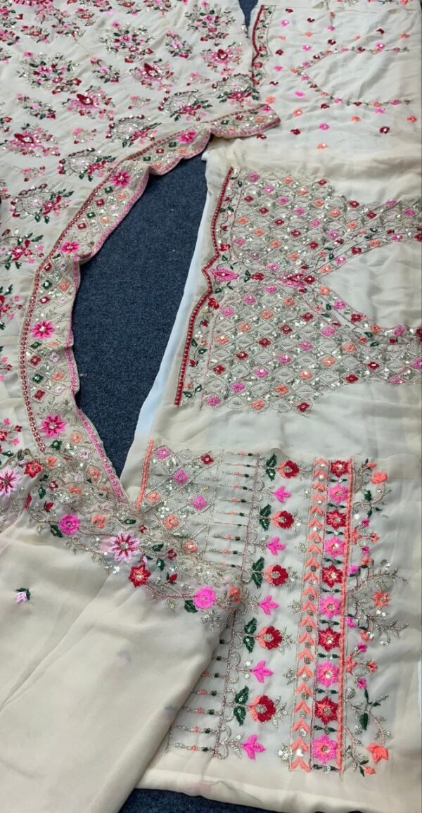 White lehenga with pink floral elegant dinner lehenga