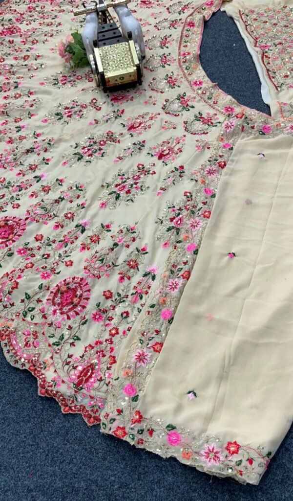 White lehenga with pink floral elegant dinner lehenga