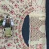 White lehenga with pink floral elegant dinner lehenga