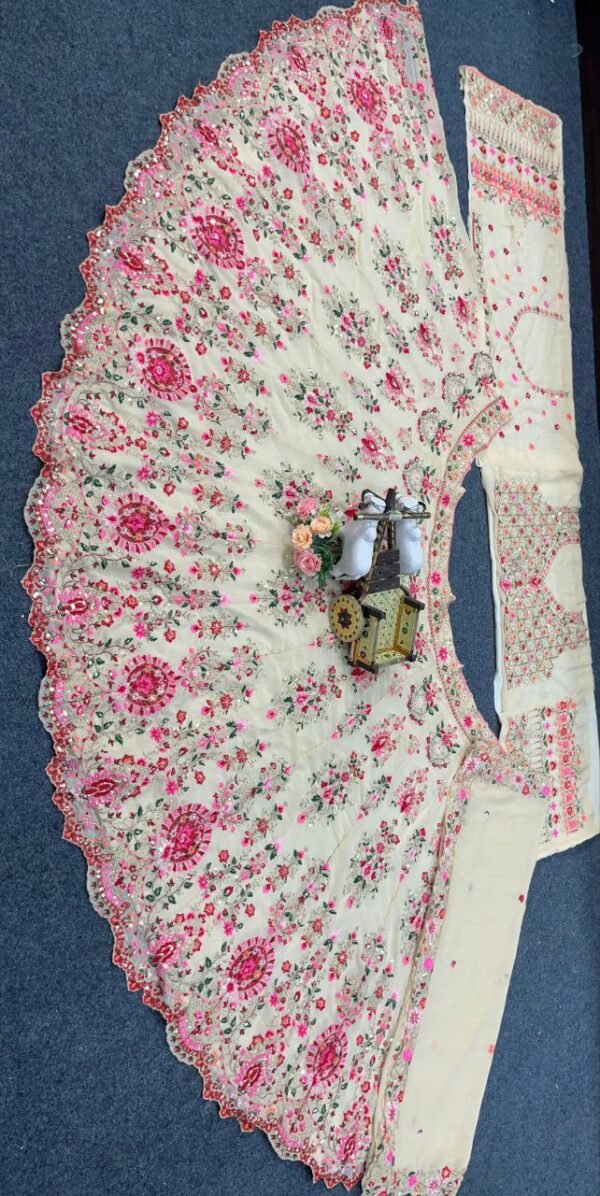 White lehenga with pink floral elegant dinner lehenga