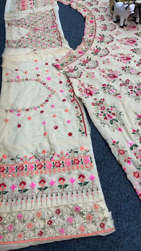 White lehenga with pink floral elegant dinner lehenga
