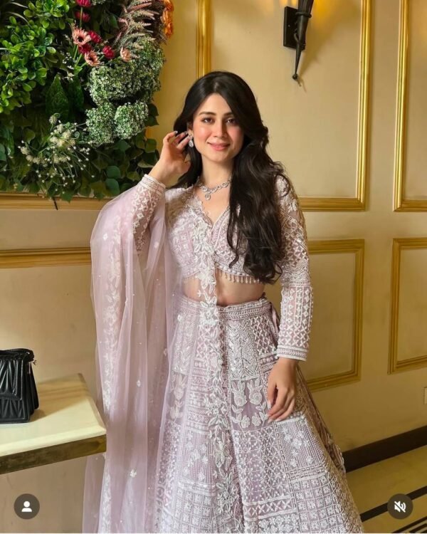 photo_6267027901513843297_y Soft Pink embroidery with tassel work dinner bridal lehenga