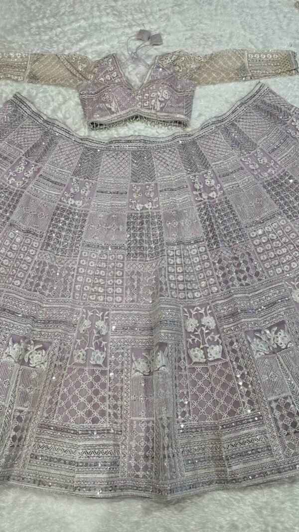 photo_6267027901513843300_y Soft Pink embroidery with tassel work dinner bridal lehenga
