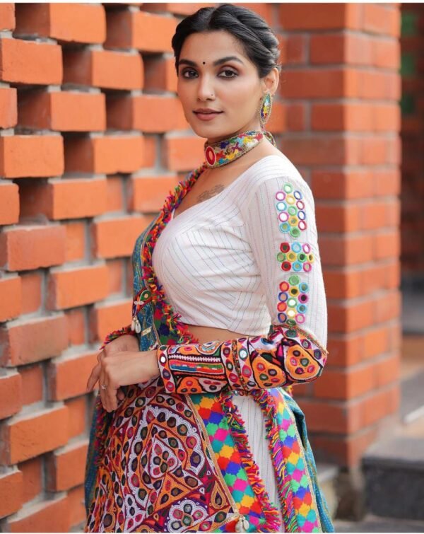 photo_6334725631299930434_y White navratri lehenga choli mirror work casual wear
