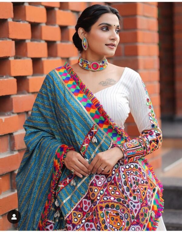photo_6334725631299930436_y White navratri lehenga choli mirror work casual wear