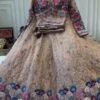 White dinner bridal lehenga colourful floral pattern