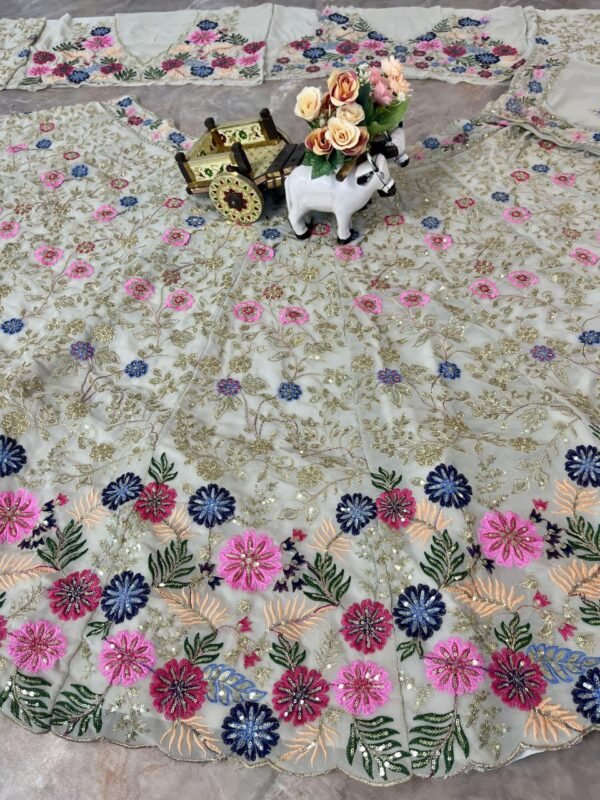 White dinner bridal lehenga colourful floral pattern