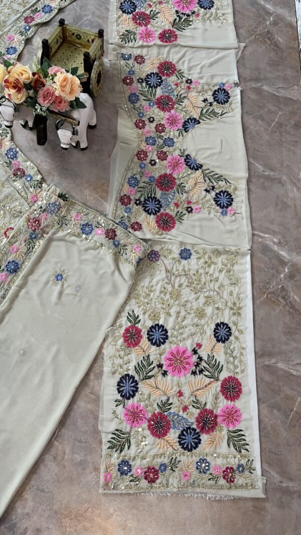 White dinner bridal lehenga colourful floral pattern