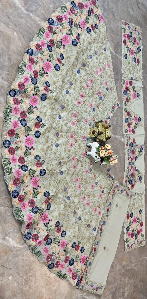White dinner bridal lehenga colourful floral pattern