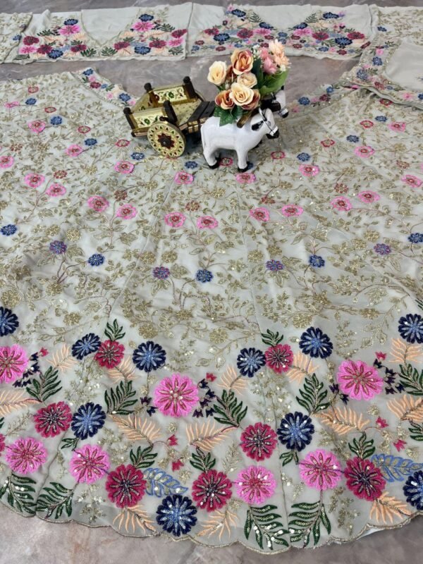 White dinner bridal lehenga colourful floral pattern