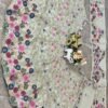 White dinner bridal lehenga colourful floral pattern