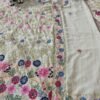 White dinner bridal lehenga colourful floral pattern