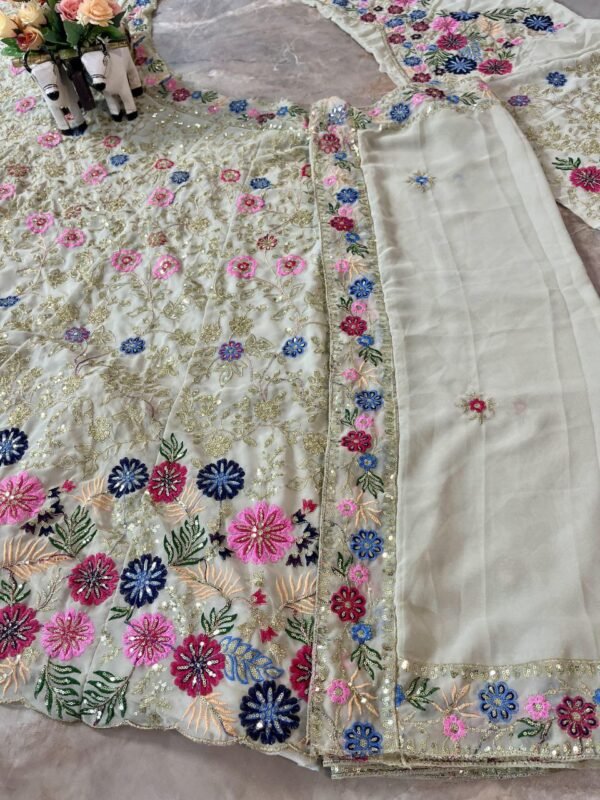 White dinner bridal lehenga colourful floral pattern