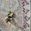 White dinner bridal lehenga colourful floral pattern