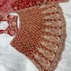 Dusty orange skirt with deep red blouse dinner lehenga