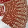 Dusty orange skirt with deep red blouse dinner lehenga