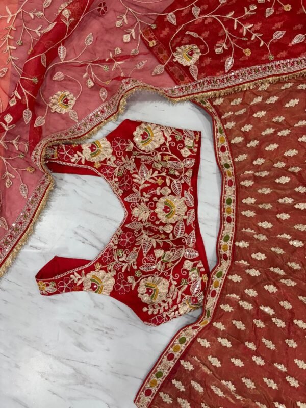 Dusty orange skirt with deep red blouse dinner lehenga