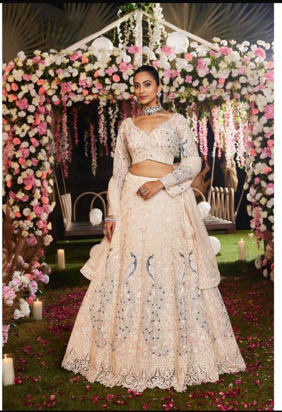 White peacock grand bridal dinner embroidery lehenga