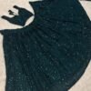 Dark green Dinner shiny sequence work lehenga