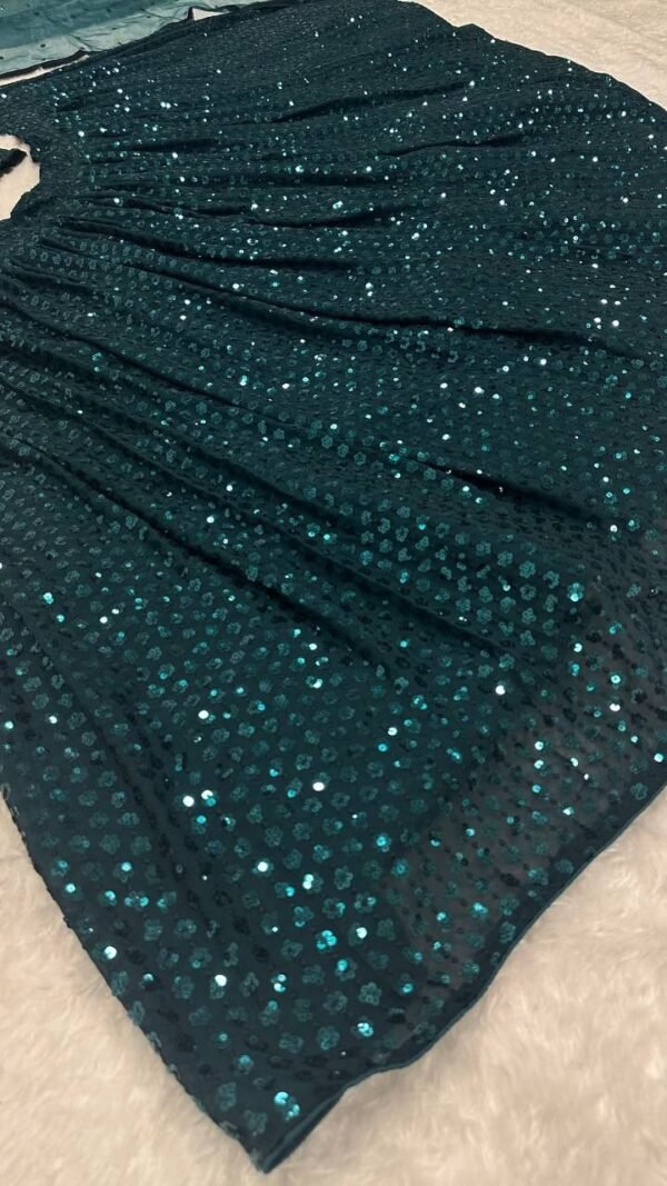 Dark green Dinner shiny sequence work lehenga